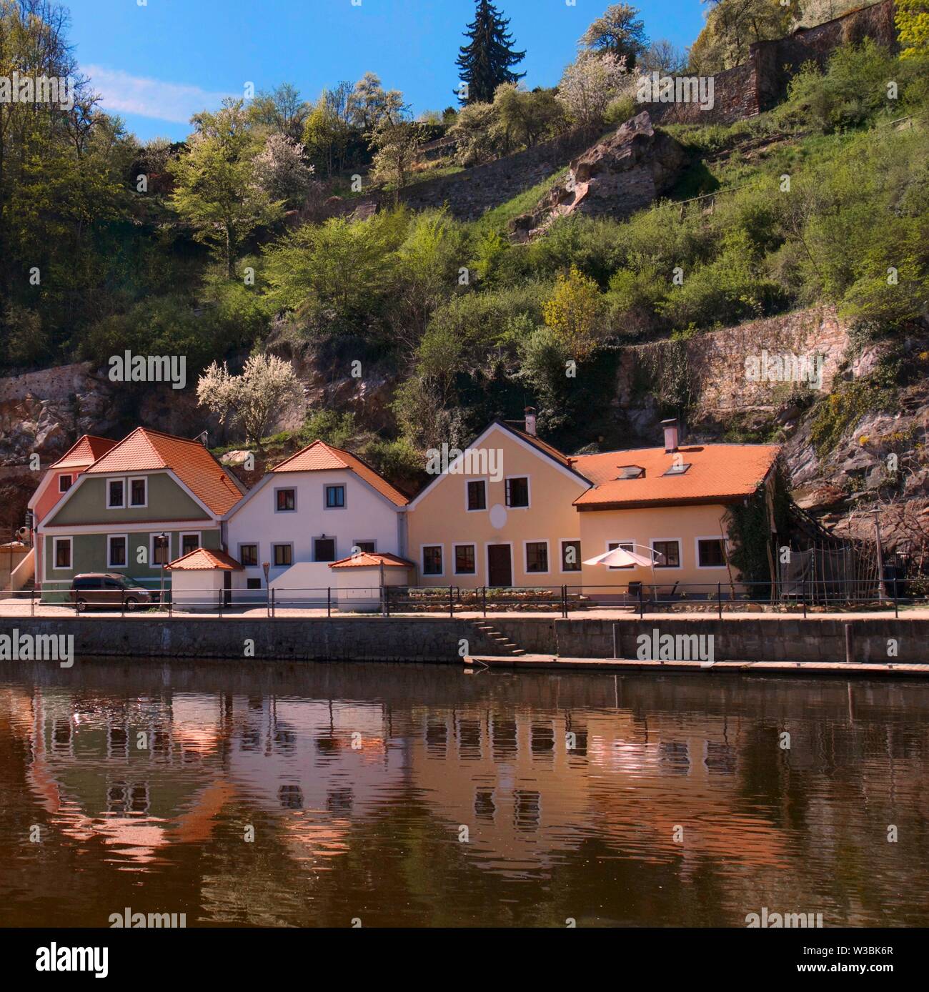 Houses on Vltava River in medieval town of Cesky Krumlov in Czech Republic. Cesky Krumlov is a UNESCO World Heritage Site. Stock Photo