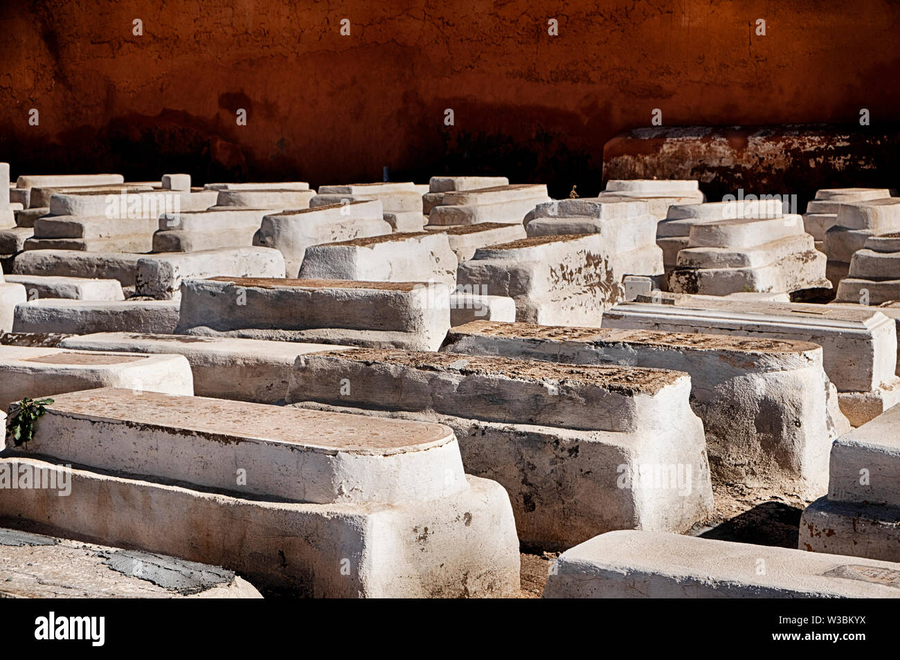 The traditional Jewish cemetery of Marrakesh, Morocco is filled with tombs painted with white paint. Stock Photo