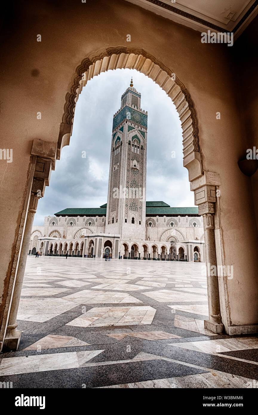 A view of the King Hassan II Mosque in Casablanca, Morocco as seen through an arch. Stock Photo