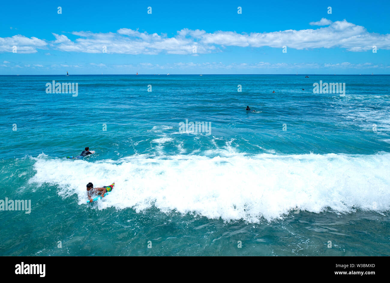 Surfer at waikiki beach hi-res stock photography and images - Alamy