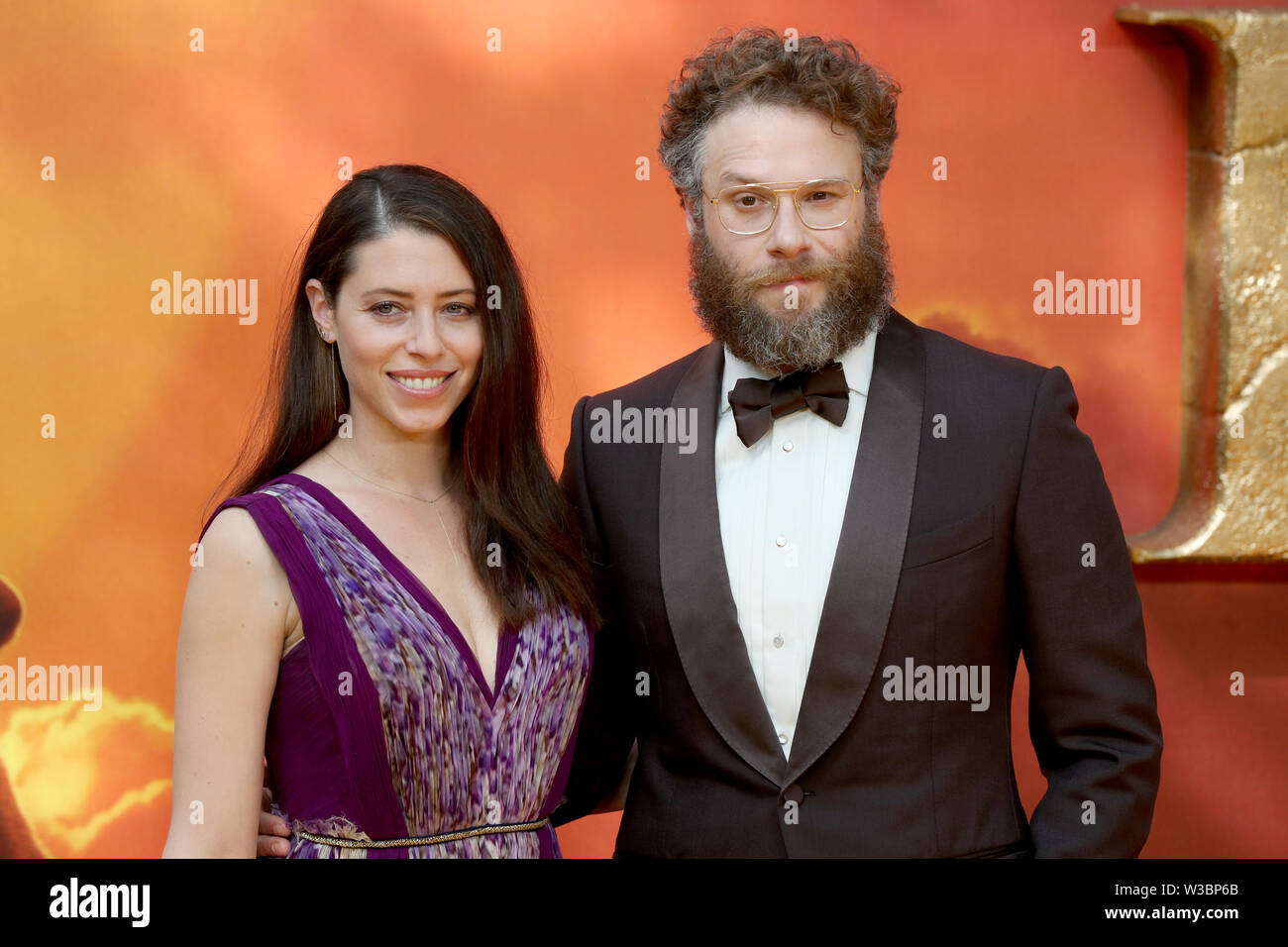 Seth Rogen and partner Lauren Miller attend the European Premiere of Disney's The Lion King at the Odeon Leicester Square, London. Stock Photo