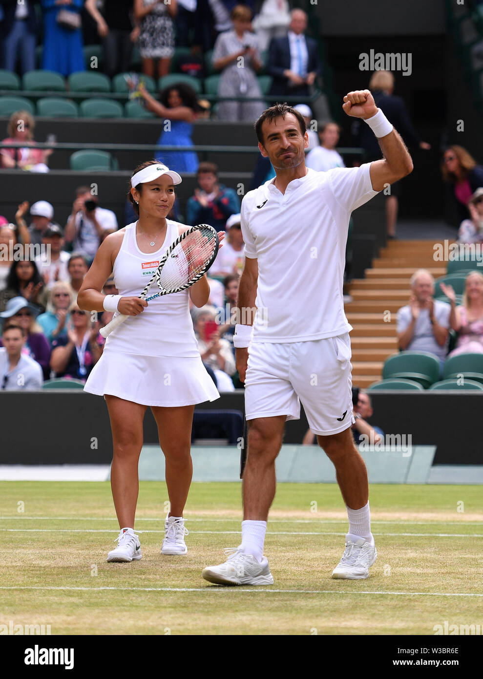 London, UK. 14th July, 2019. Ivan Dodig (R) of Croatia and Latisha Chan of  Chinese Taipei celebrate after winning the mixed doubles final match  against Robert Lindstedt of Sweden and Jelena Ostapenko