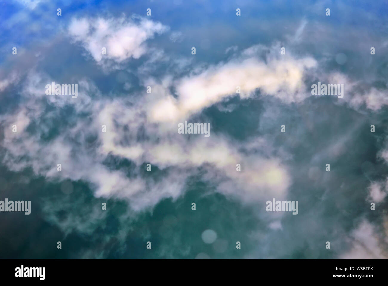 Sky reflected in surf hi-res stock photography and images - Alamy
