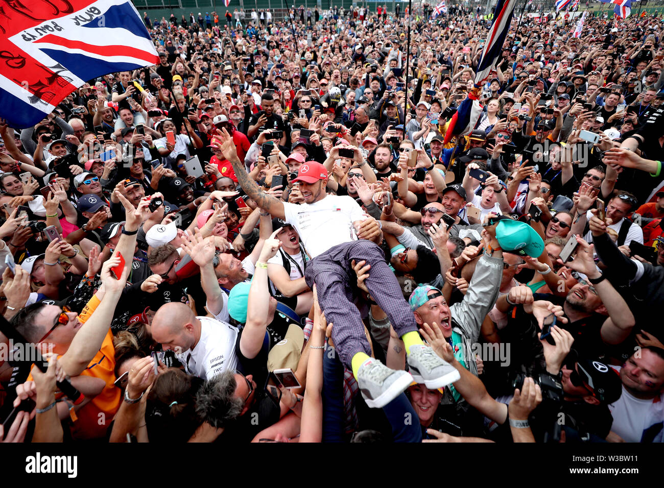 Mercedes Lewis Hamilton Celebrates With Fans After Winning The British Grand Prix At Silverstone Towcester Stock Photo Alamy