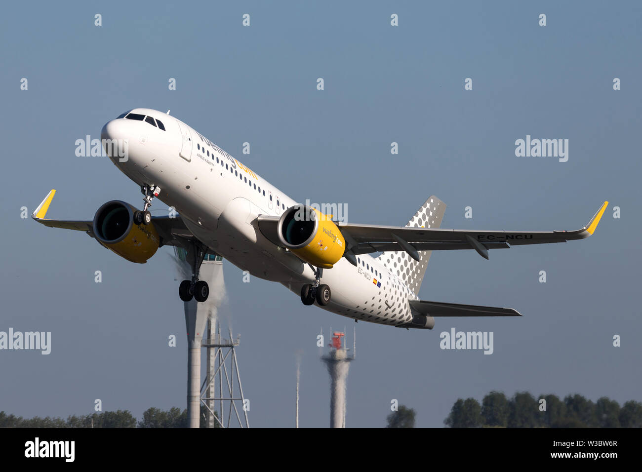 Spanish Vueling Airbus A320neo with registration EC-NCU just airborne at Amsterdam Airport Schiphol. Stock Photo