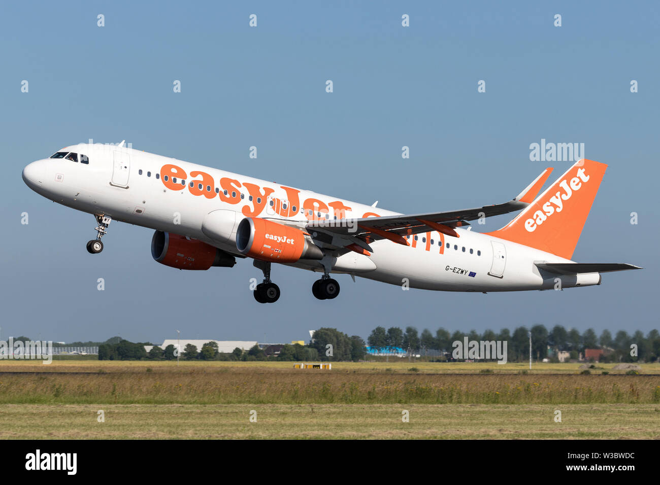 British Easyjet Airbus A320-200 With Registration G-ezwy Taking Off 