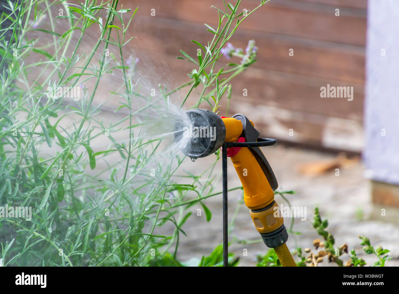 Portable garden automatic plastic pipe irrigation system with a mounted