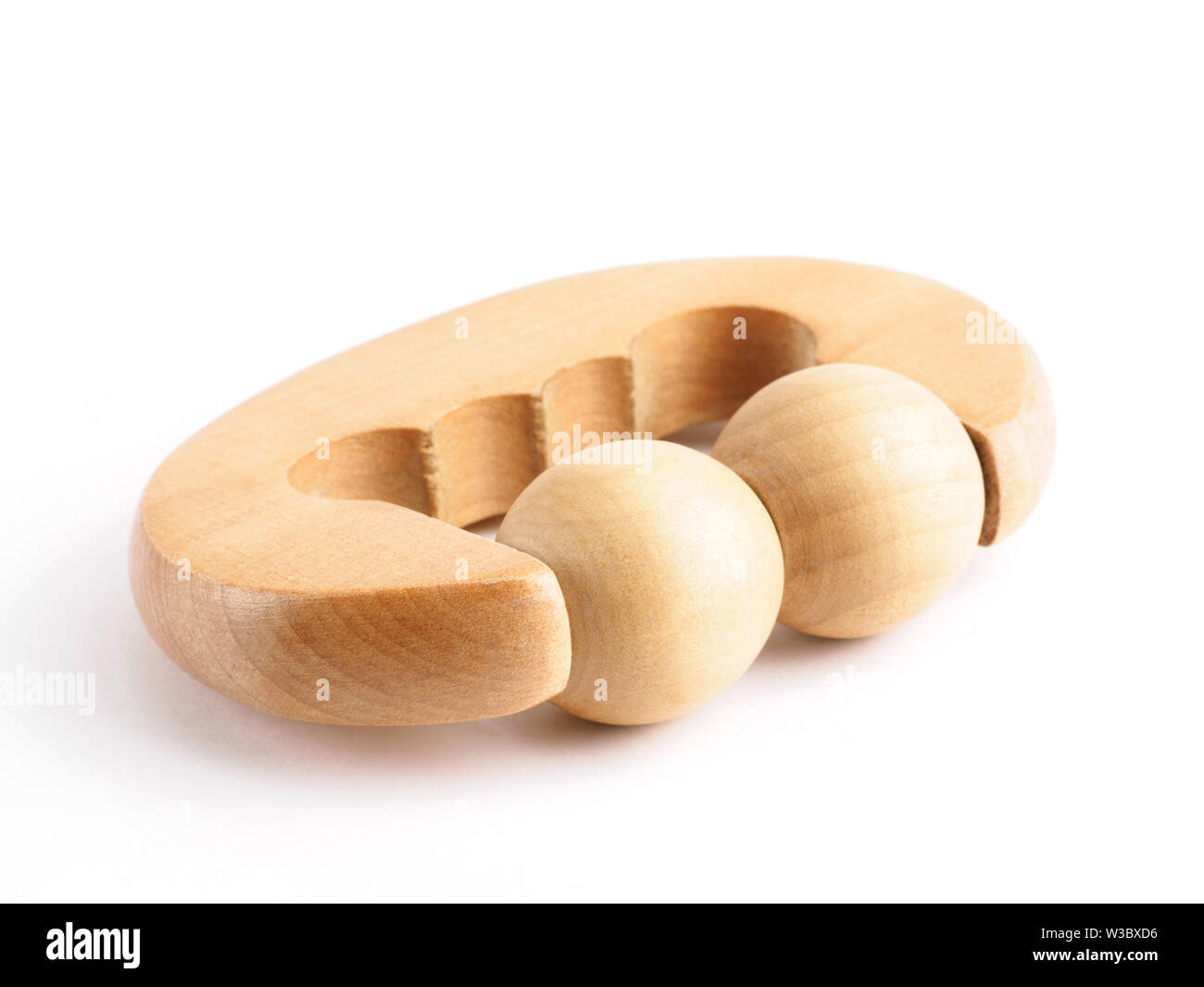 Wooden body massager on white background Stock Photo
