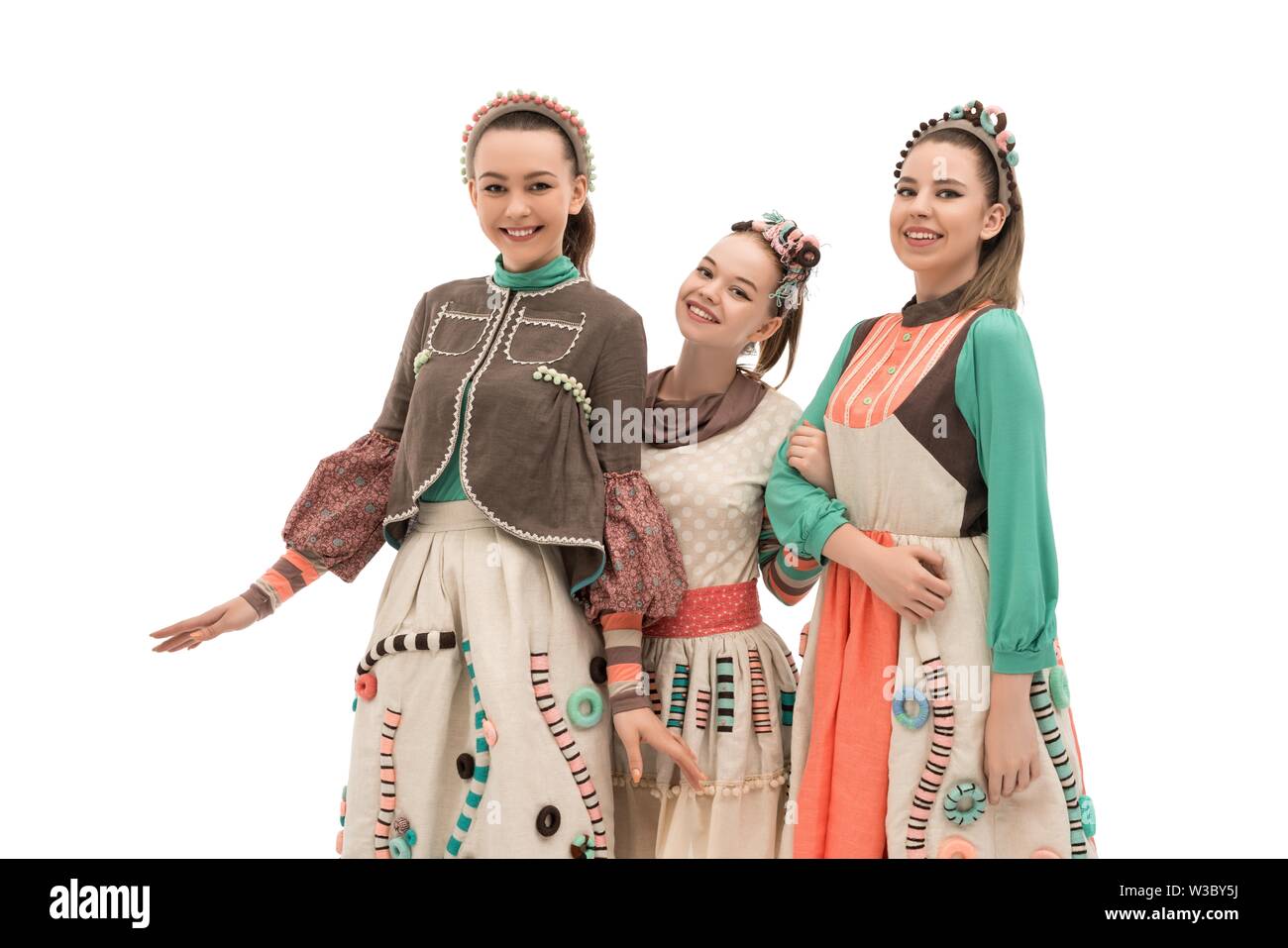 Teenagers in art fashion dresses isolated view Stock Photo - Alamy