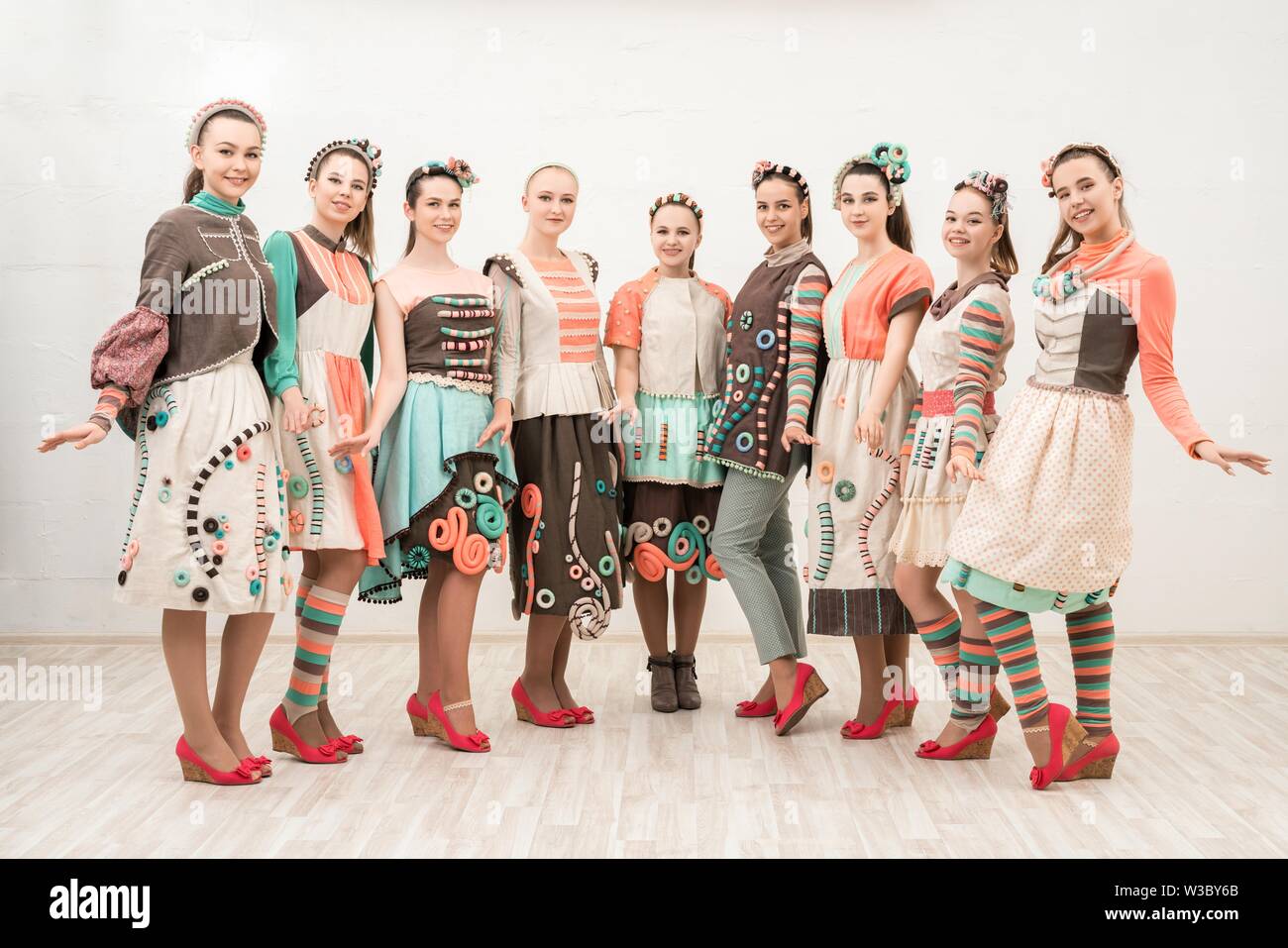 Young girls in art costumes group portrait Stock Photo - Alamy