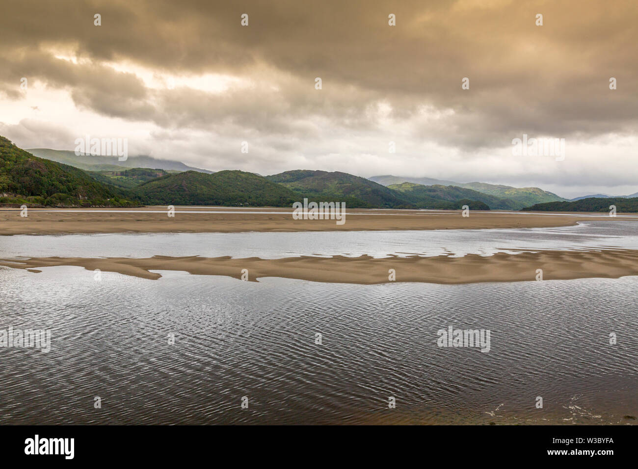 The shifting sands at the mouth of the Mawddach estuary in Barmouth, Gwynedd, Wales, UK Stock Photo