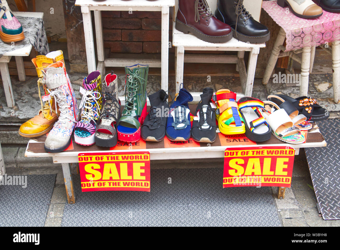 A colourful display of shoes for sale in Takeshita-dori in the Harajuku district of Tokyo, Japan Stock Photo