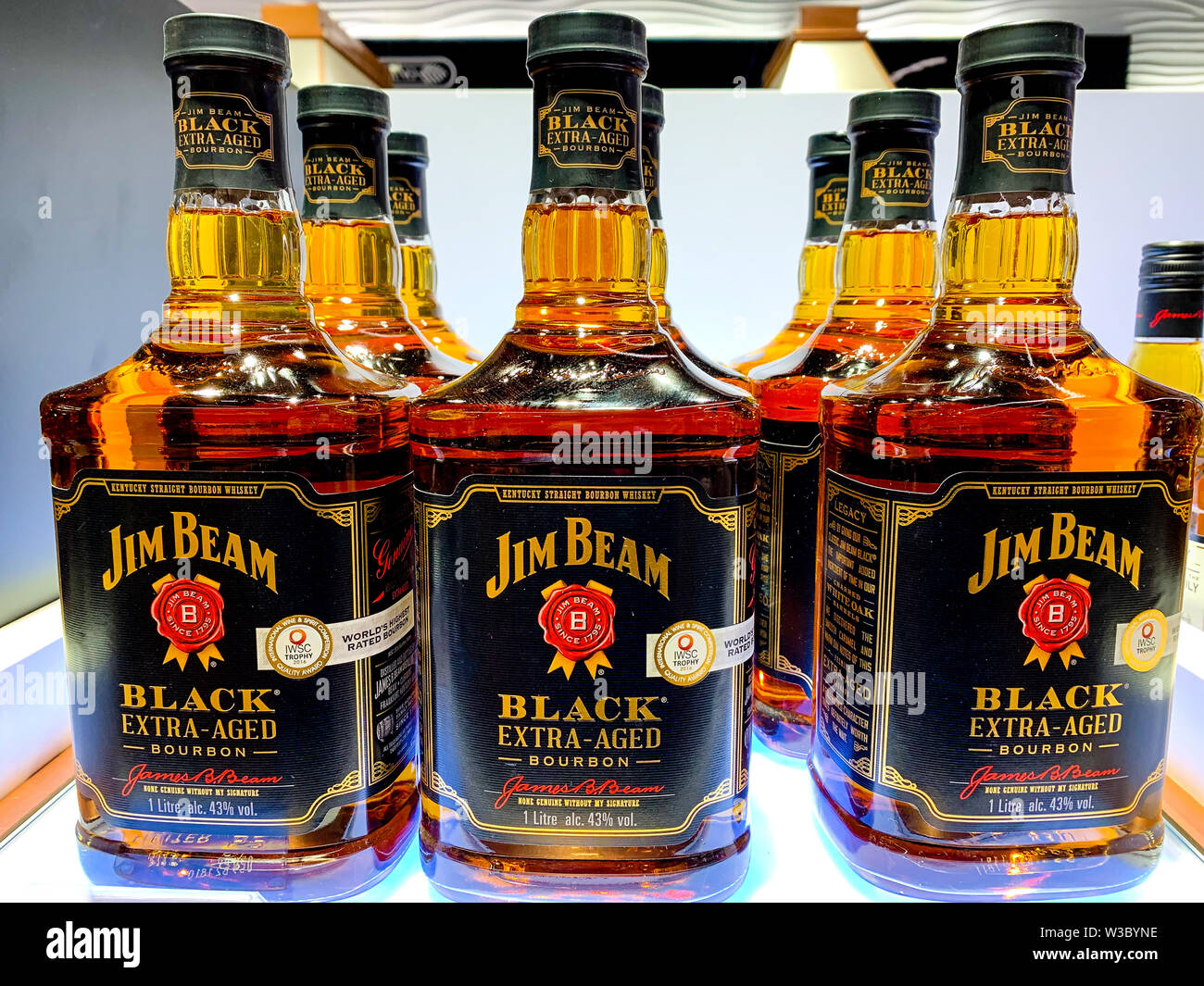 Bottles of Jim Beam, extra aged black bourbon with 43% alcohol on display. Jim Beam is a brand of bourbon whiskey produced in Clermont, Kentucky. Ista Stock Photo