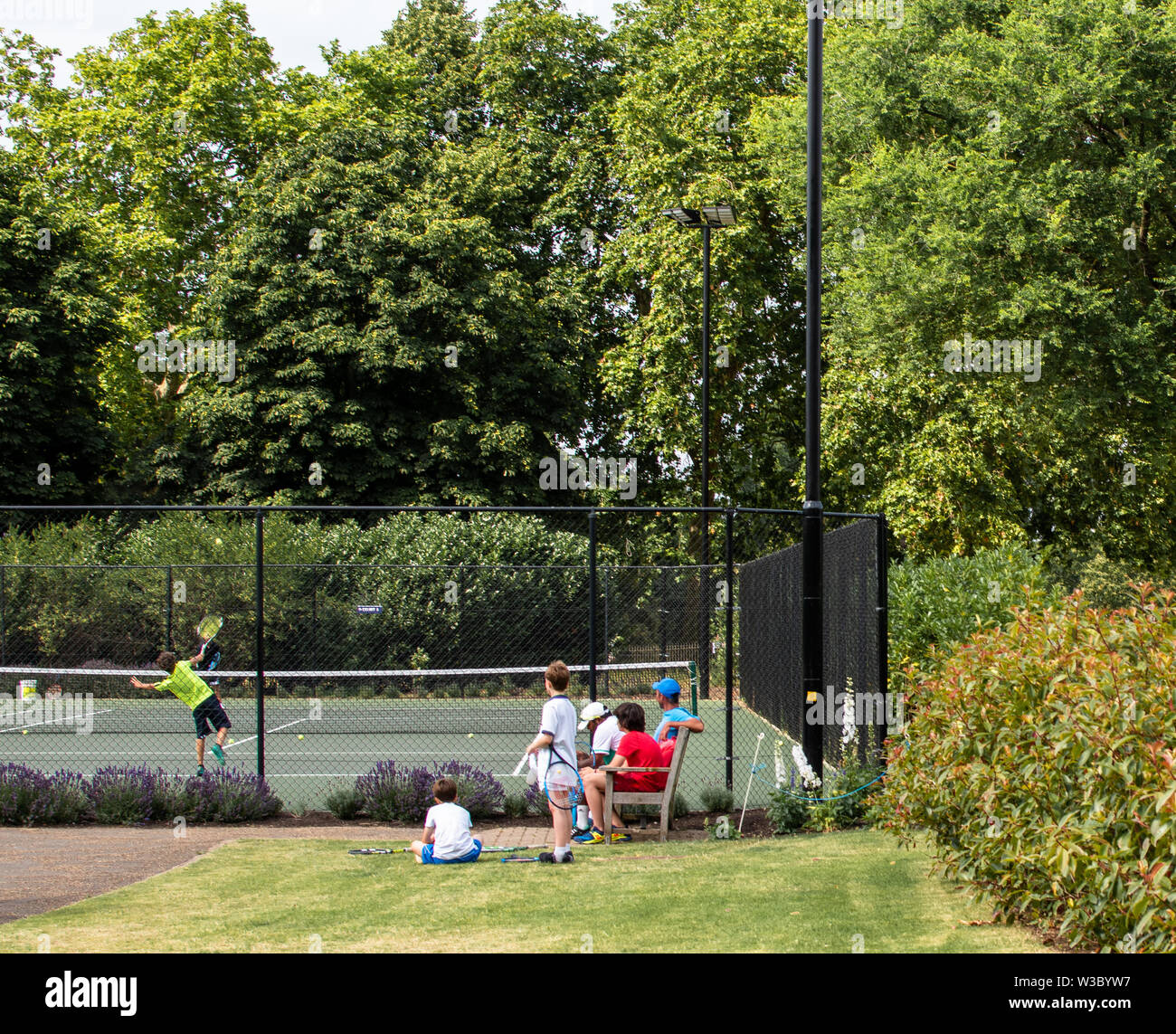 Children playing tennis Stock Photo