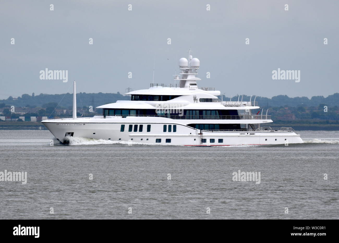 Super yacht Sixth Sense cruises to London for a launch party. Sixth Sense was designed my marine architect Tim Heywood. Stock Photo