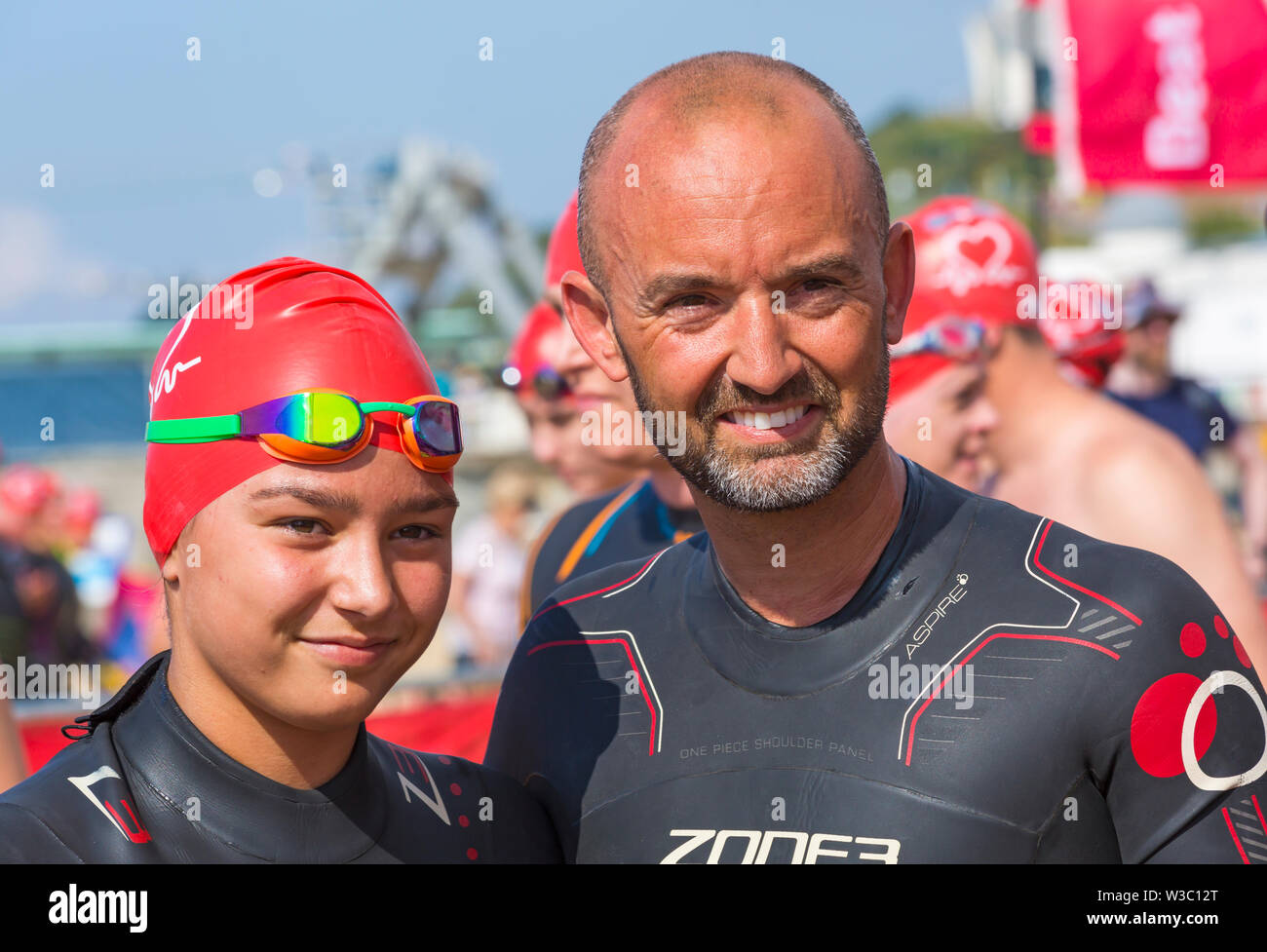 Bournemouth, Dorset UK. 14th July 2019. Pier to Pier swim where swimmers brave the English Channel swimming from Bournemouth to Boscombe piers in 1.4 mile open water challenge, raising funds for BHF, British Heart Foundation. Credit: Carolyn Jenkins/Alamy Live News Stock Photo