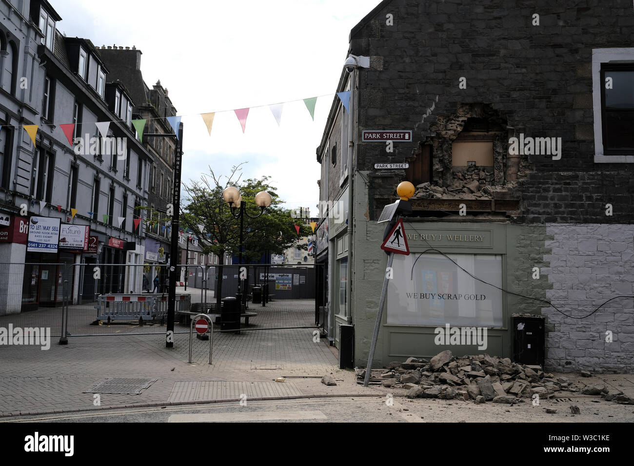 Galashiels, Scotland, UK. 14th July 2019.     Building Collapse, Galashiels The scene in Galashiels after part of an upper floor house exterior wall collapsed. A street in Galashiels town centre is currently closed after part of a building collapsed. The incident happened in Park Street this morning (Sunday). No one was injured.  Credit: Rob Gray/Alamy Live News Stock Photo