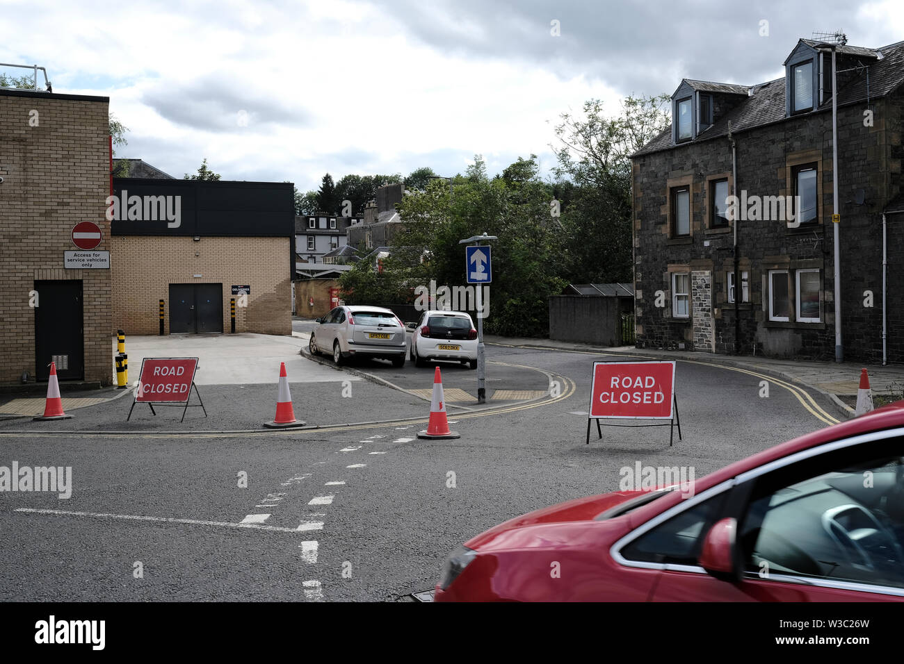 Galashiels, Scotland, UK. 14th July 2019.     Building Collapse, Galashiels The scene in Galashiels after part of an upper floor house exterior wall collapsed. A street in Galashiels town centre is currently closed after part of a building collapsed. The incident happened in Park Street this morning (Sunday). No one was injured.  Credit: Rob Gray/Alamy Live News Stock Photo