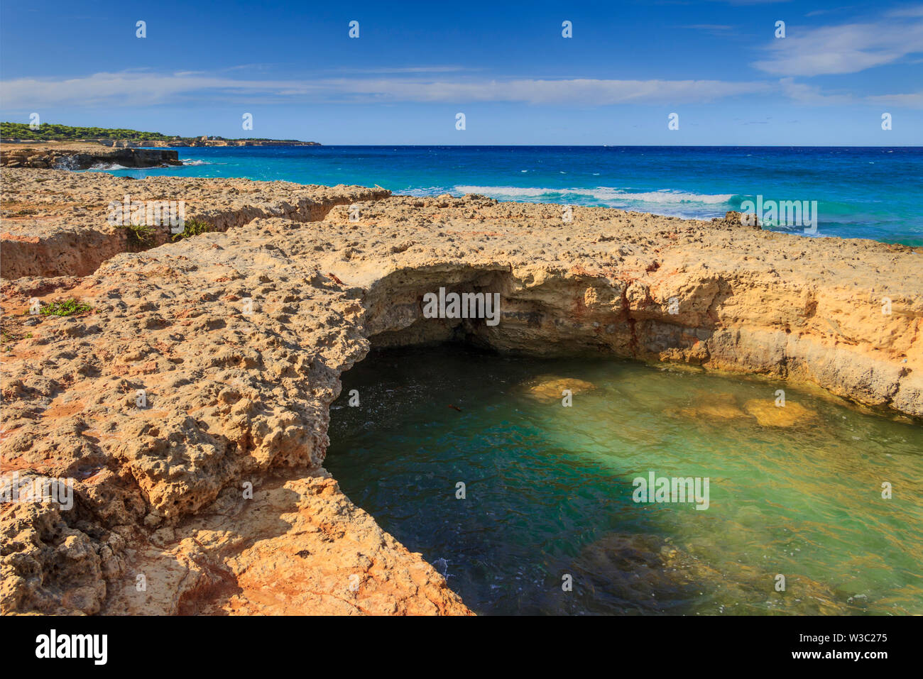 Salento coast: seascape with white rocky cliffs, caves, sea bay. Conca is characterized by small sandy coves and cliffs ( Apulia, ITALY). Stock Photo
