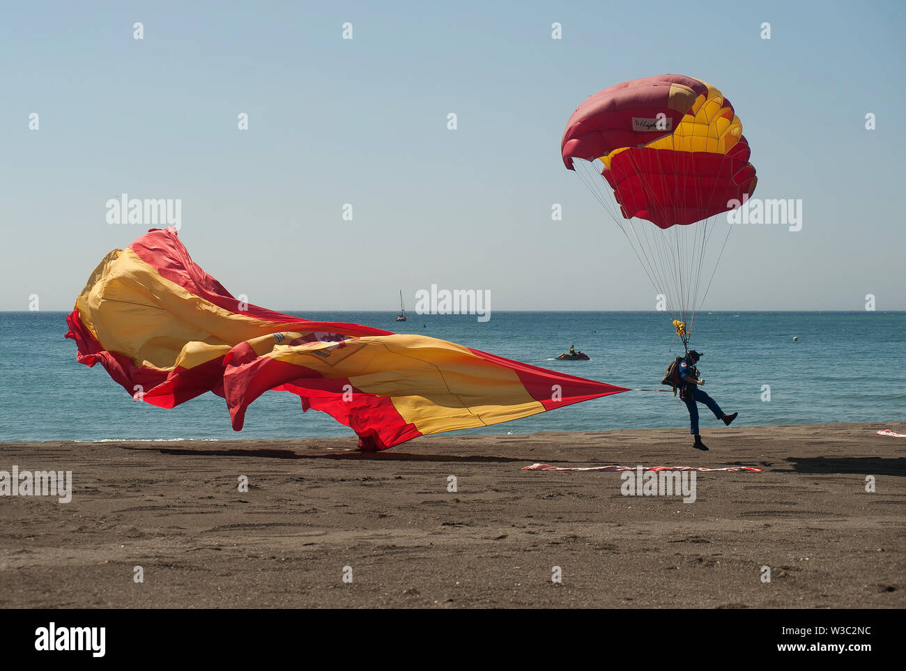 A Spanish Paratrooper Lands At The Beach After His