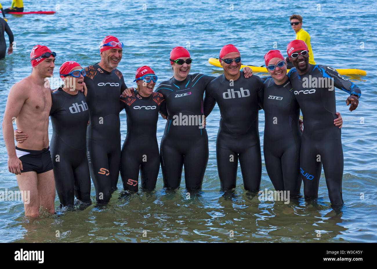 Bournemouth, Dorset UK. 14th July 2019. Pier to Pier swim where swimmers brave the English Channel swimming from Bournemouth to Boscombe piers in 1.4 mile open water challenge, raising funds for BHF, British Heart Foundation. Credit: Carolyn Jenkins/Alamy Live News Stock Photo