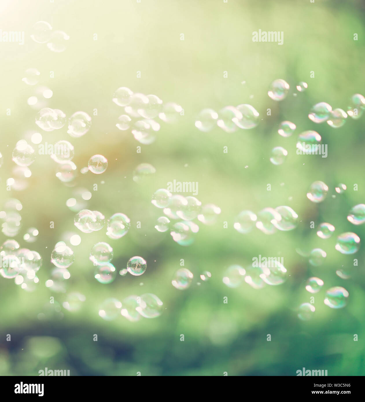 rainbow bubbles from the bubble blower Stock Photo