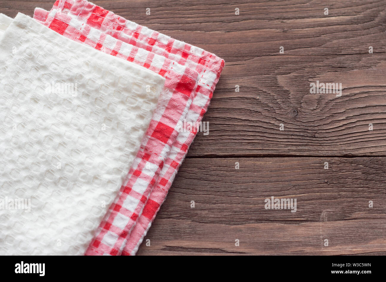 stack of kitchen towels on wooden background Stock Photo