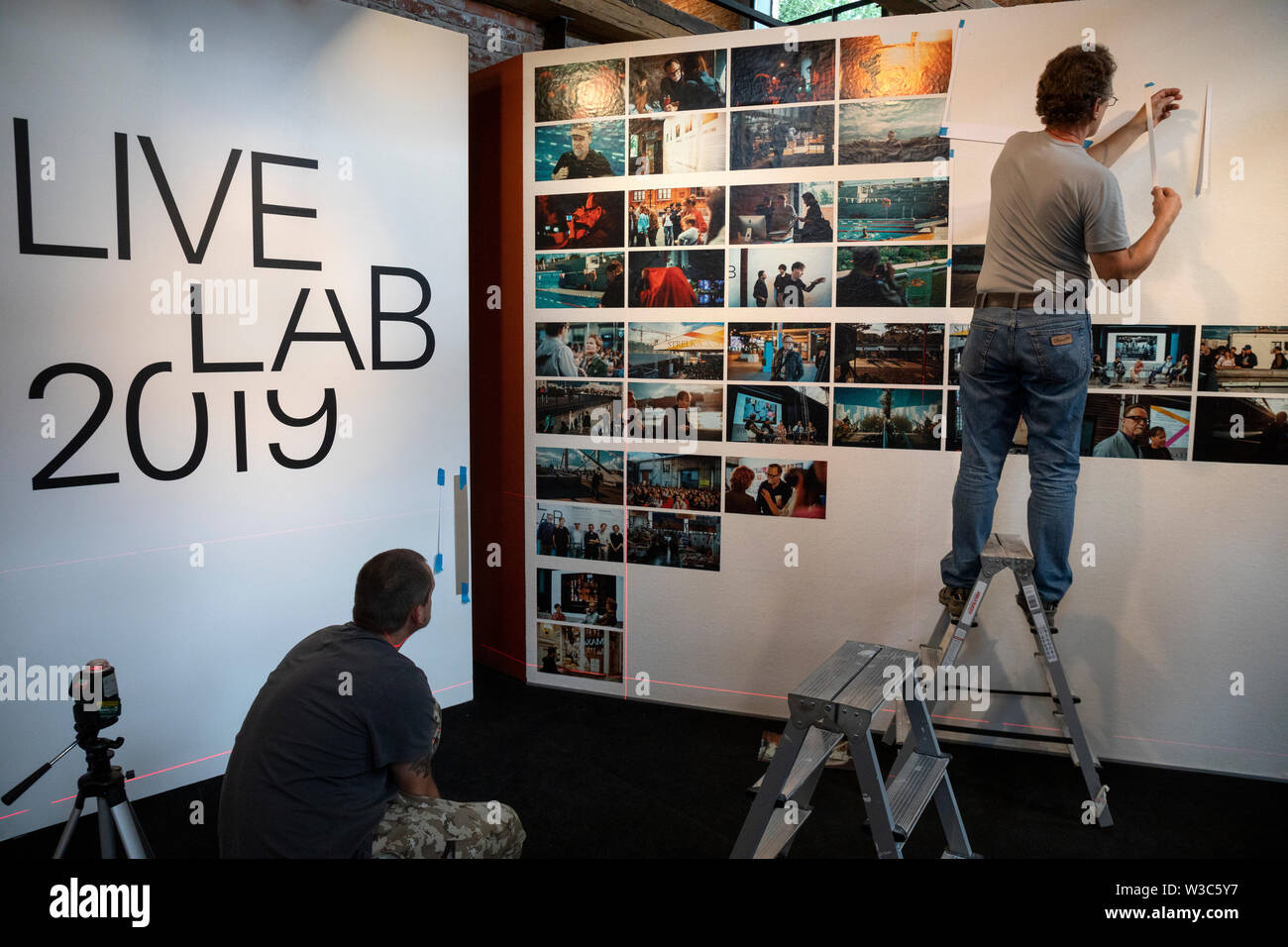 Preparing an exhibition of photographs of Moscow by Gueorgui Pinkhassov