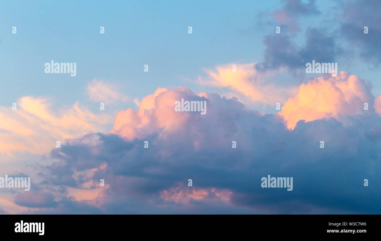 Evening sunset cloudy sky background Stock Photo - Alamy