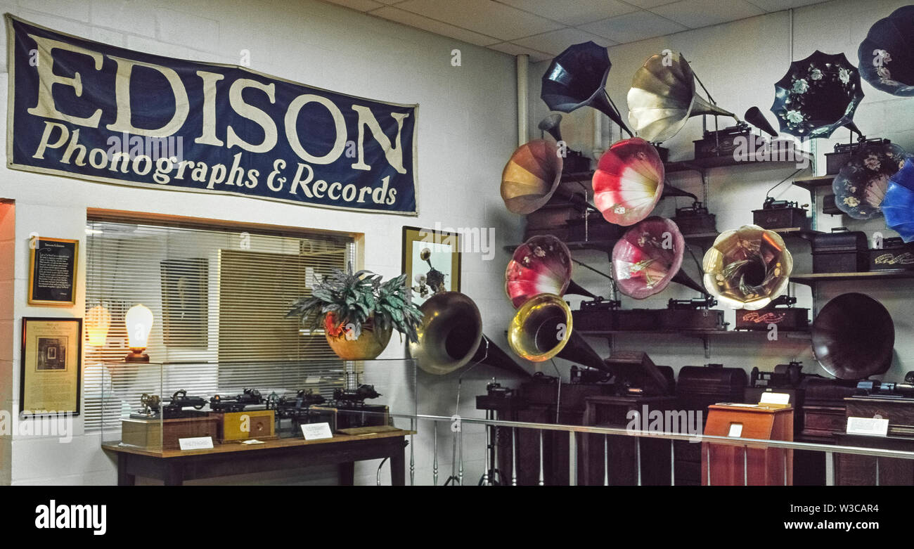 Early phonographs first invented by American Thomas Alva Edison in 1877 are on display in Fort Myers, Florida, USA, at his winter estate, which is now a sprawling historical museum where visitors can also see other famous Edison inventions that included incandescent light bulbs and the motion picture camera. His initial phonograph used a rotating cylinder covered with tinfoil to record and play back sound. Later models utilized wax-coated cylinders and were fitted with large horns to amplify the sound. Stock Photo