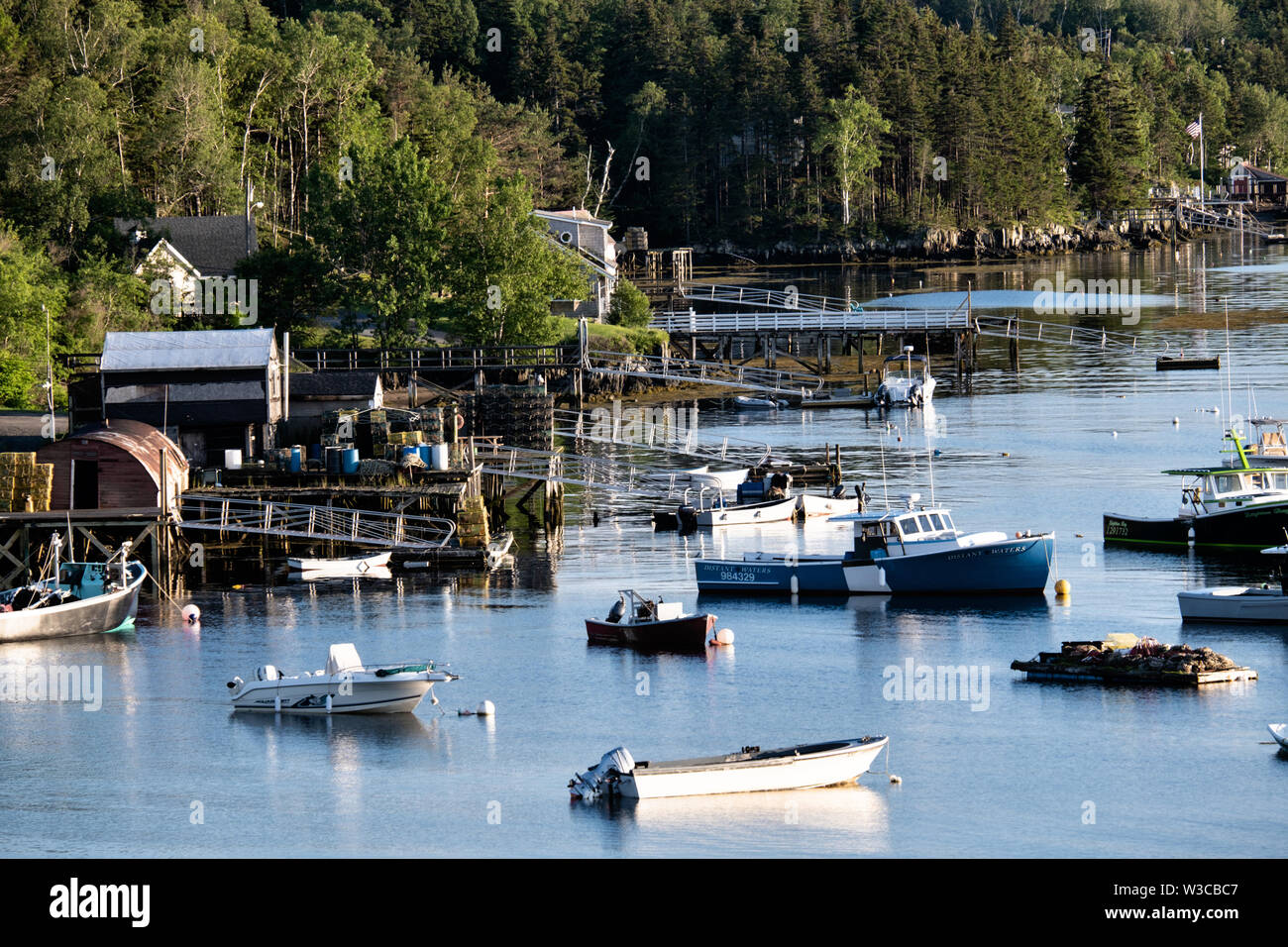 Lobster fishing boats moored in Mackerel Cove, Bailey Island on a summers day in Harpswell, Maine. Stock Photo