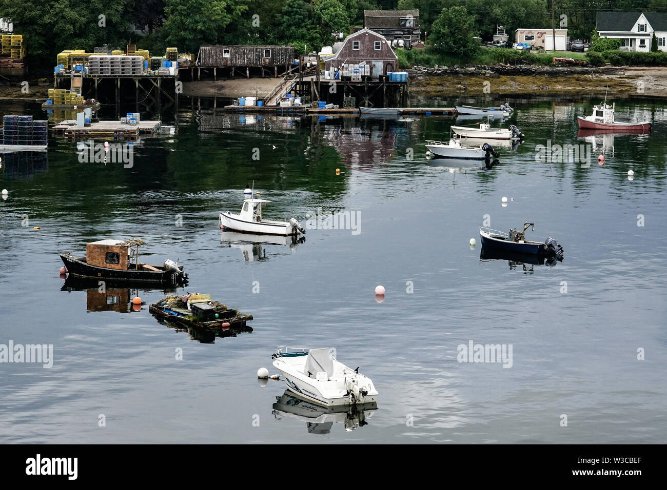 Lobster fishing boats moored in Mackerel Cove on Bailey Island on a summers day in Harpswell, Maine. Stock Photo