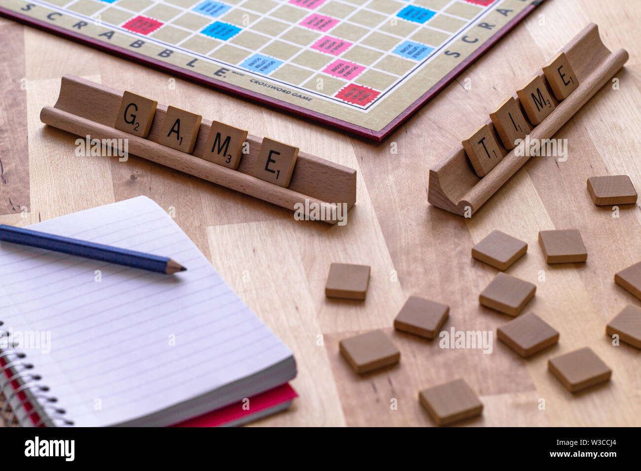 Scrabble board game with the scrabble tile spell "Game Time Stock Photo Alamy