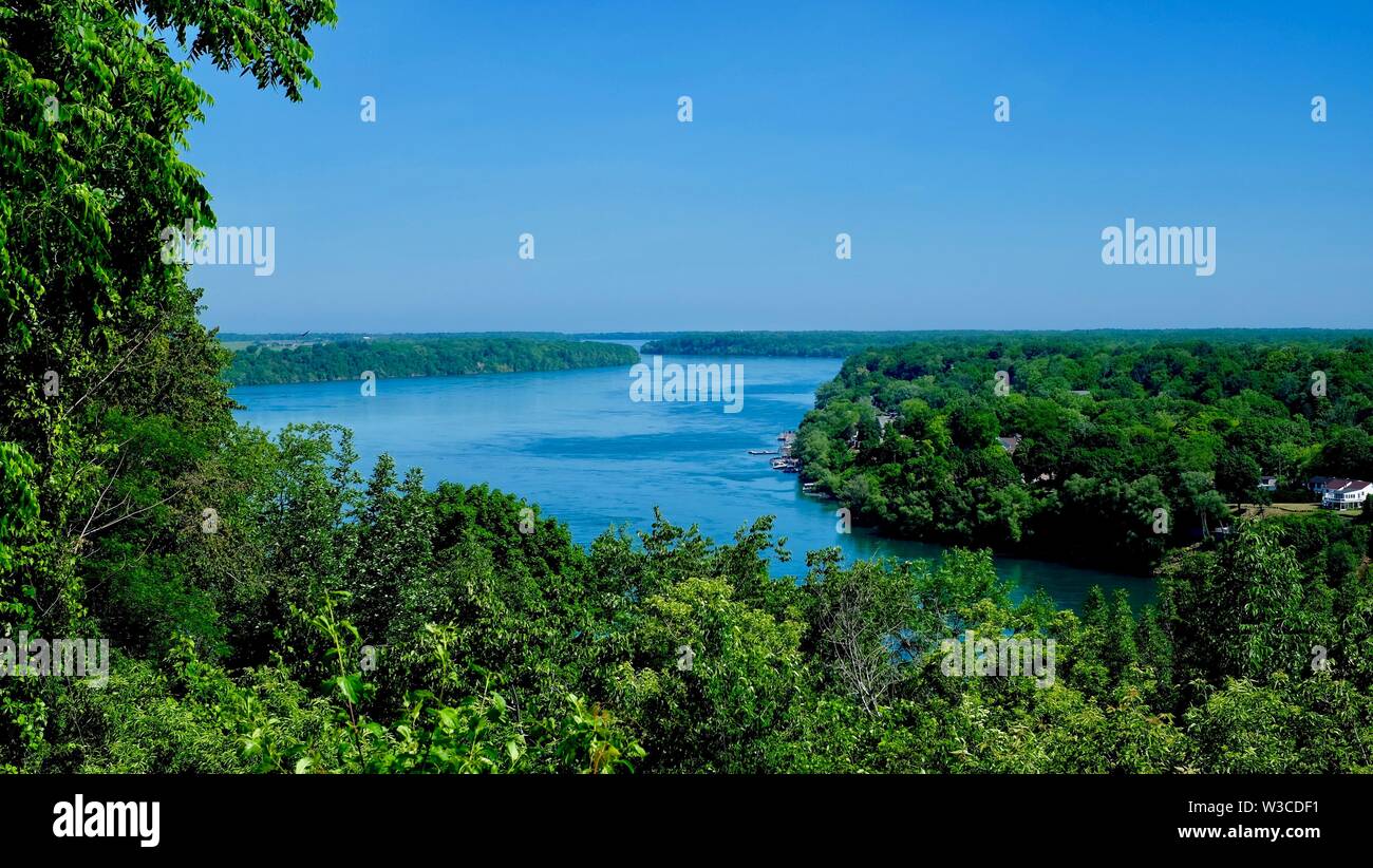 niagara river flows through the woodland Stock Photo Alamy
