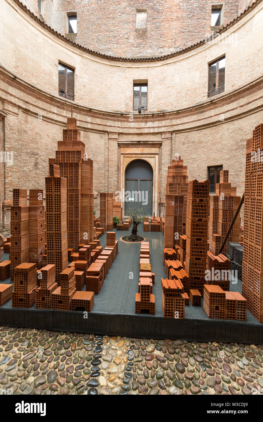 Contemporary art exhibition in central circular courtyard of Andrea Mantegna House in Mantua
