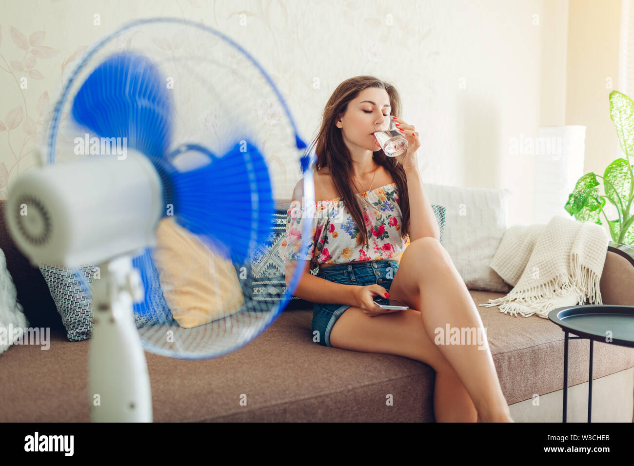 6,240 Beautiful Woman Cooling Fan Royalty-Free Images, Stock