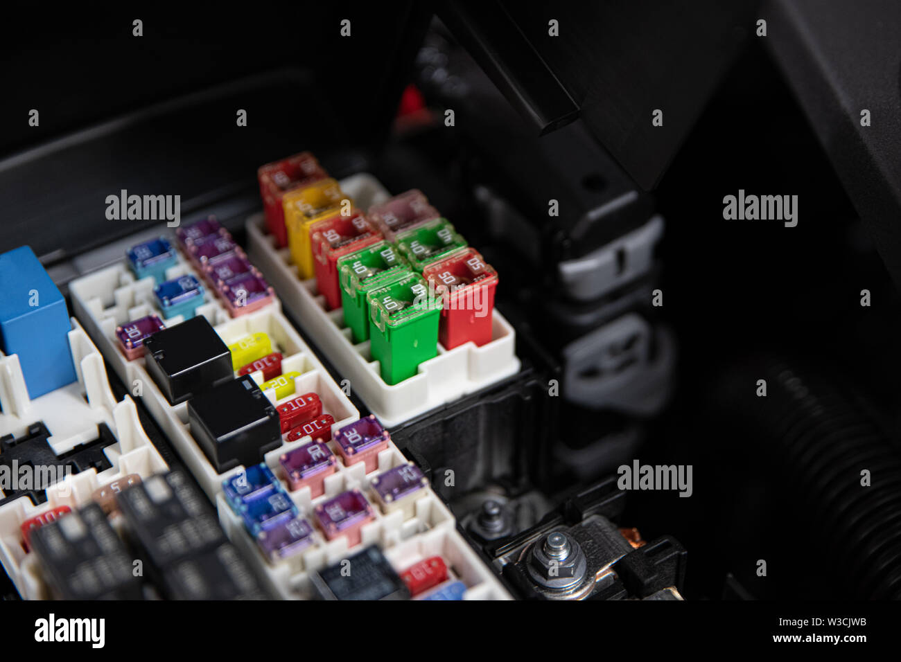 Car electric fuses and relays. Vehicle electric installation Stock