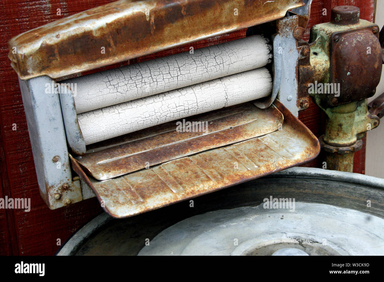 Vintage roller type washing machine ringers rollers rusty aged Stock Photo
