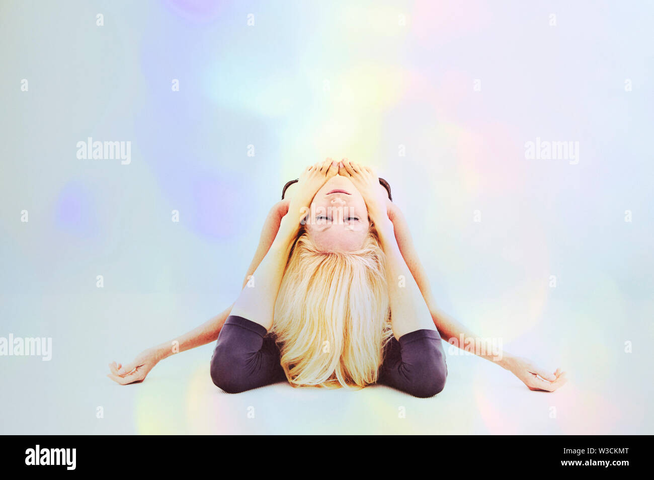 Advanced Yoga Practitioner Woman in Extreme Yoga Pose Stock Photo - Alamy