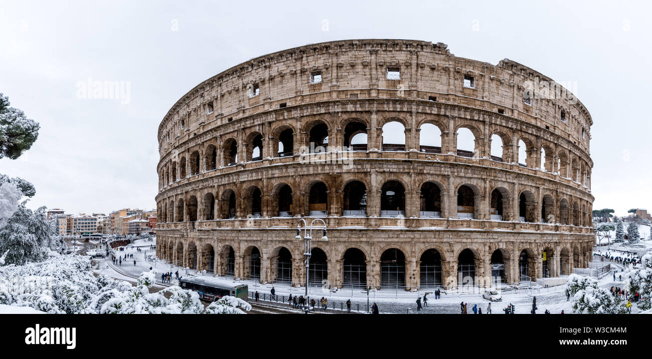 The Roman Colosseum after a winder snowfall in Rome, Italy. Stock Photo
