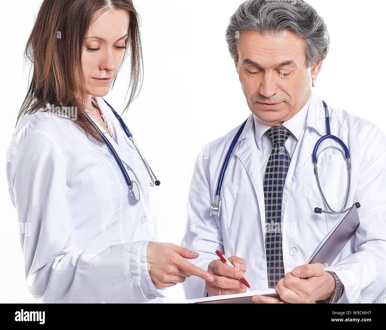 Two Physicians two physician discuss the diagnosis of the patient.isolated on white ...
