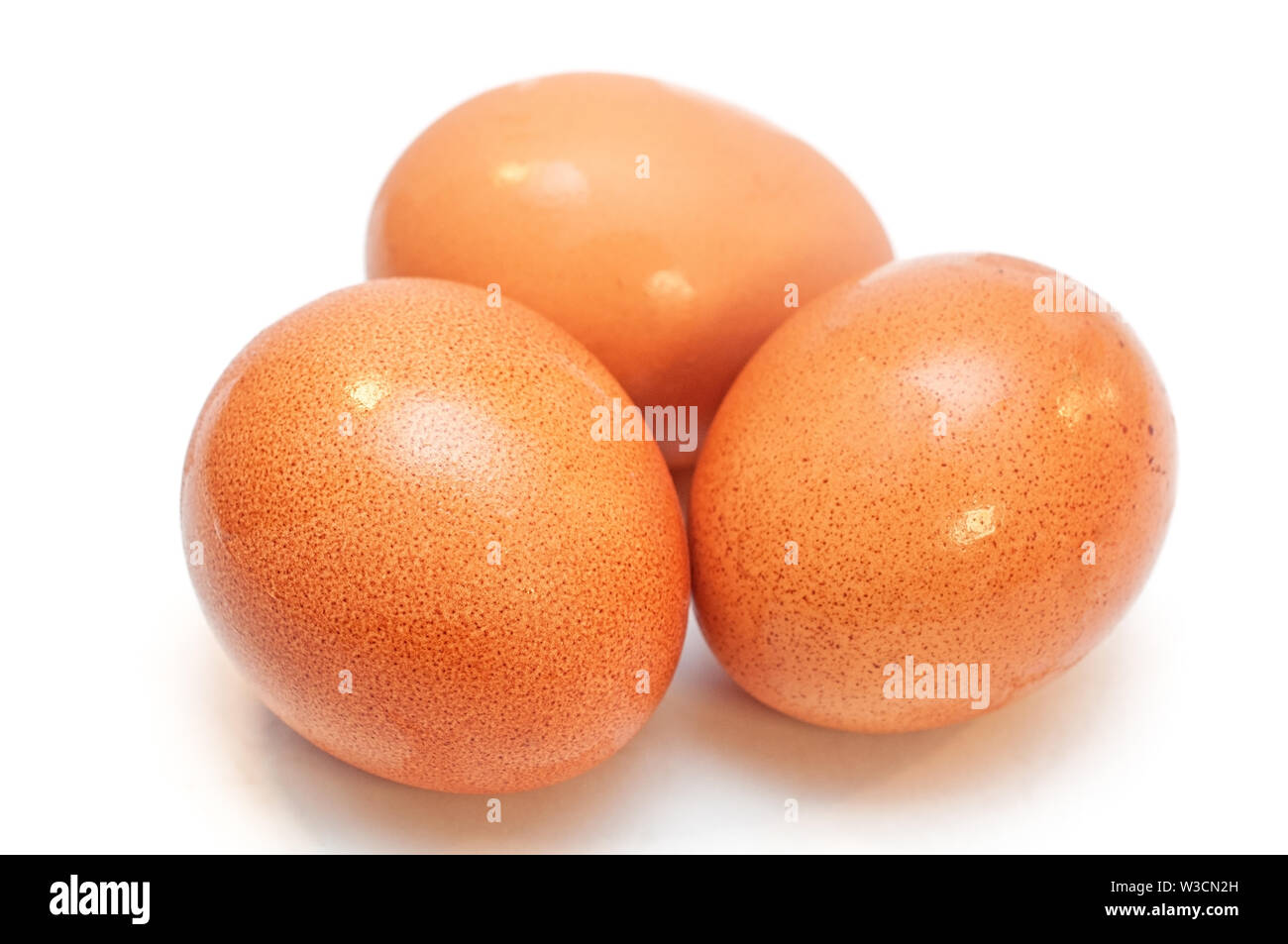 Chicken eggs isolated on white background Stock Photo
