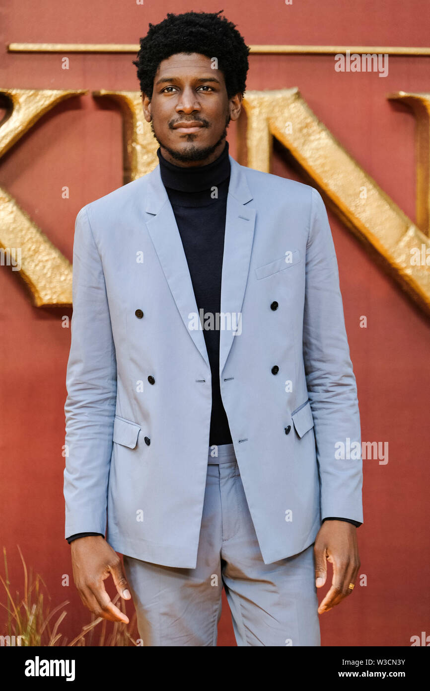 London, UK. 14th July 2019. Labrinth poses on the yellow carpet at the European premiere of Disneys 'The Lion King' on Sunday 14 July 2019 at ODEON LUXE Leicester Square, London. Labrinth, Timothy Lee McKenzie. Picture by Julie Edwards. Credit: Julie Edwards/Alamy Live News Stock Photo