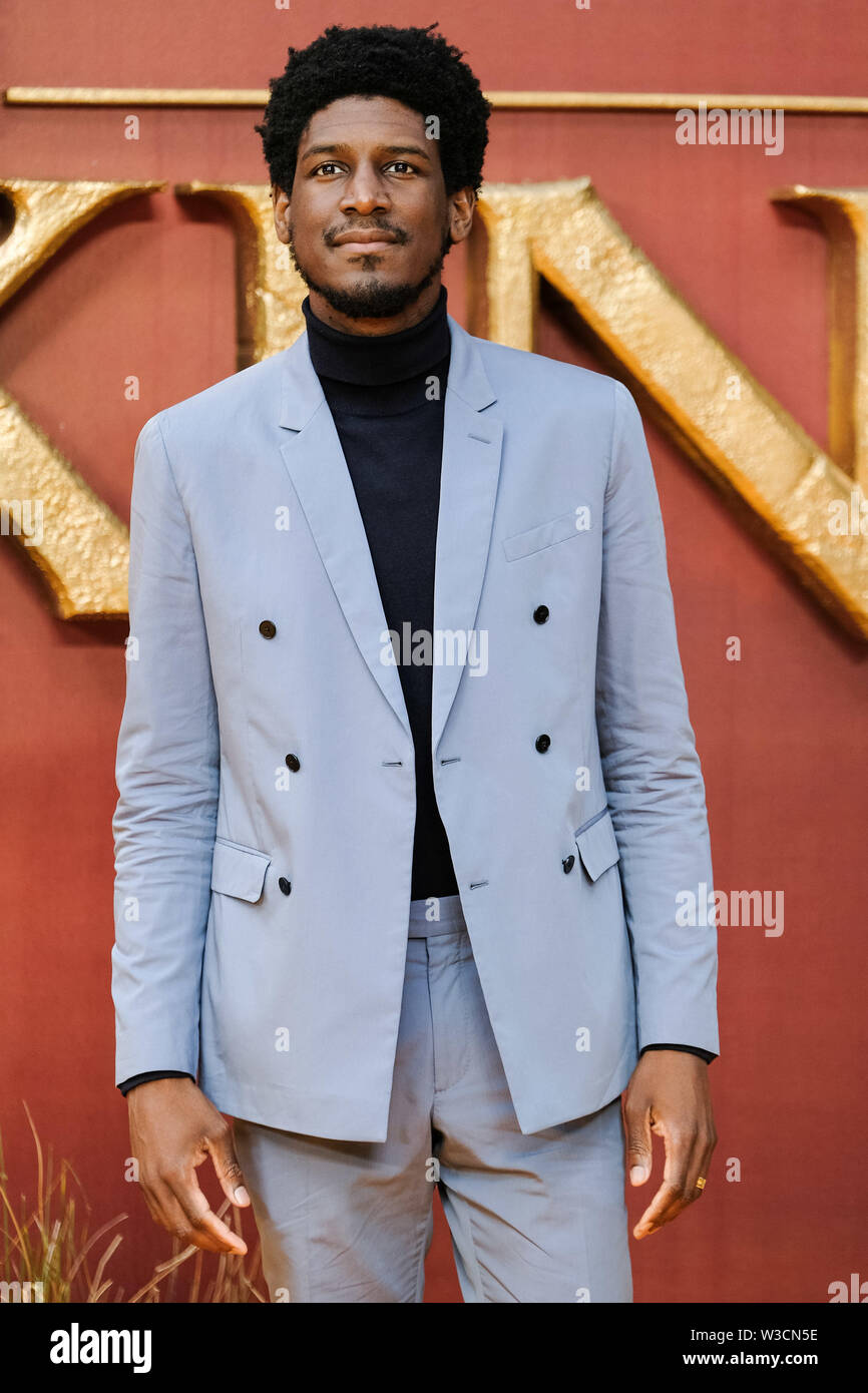 London, UK. 14th July 2019. Labrinth poses on the yellow carpet at the European premiere of Disneys 'The Lion King' on Sunday 14 July 2019 at ODEON LUXE Leicester Square, London. Labrinth, Timothy Lee McKenzie. Picture by Julie Edwards. Credit: Julie Edwards/Alamy Live News Stock Photo