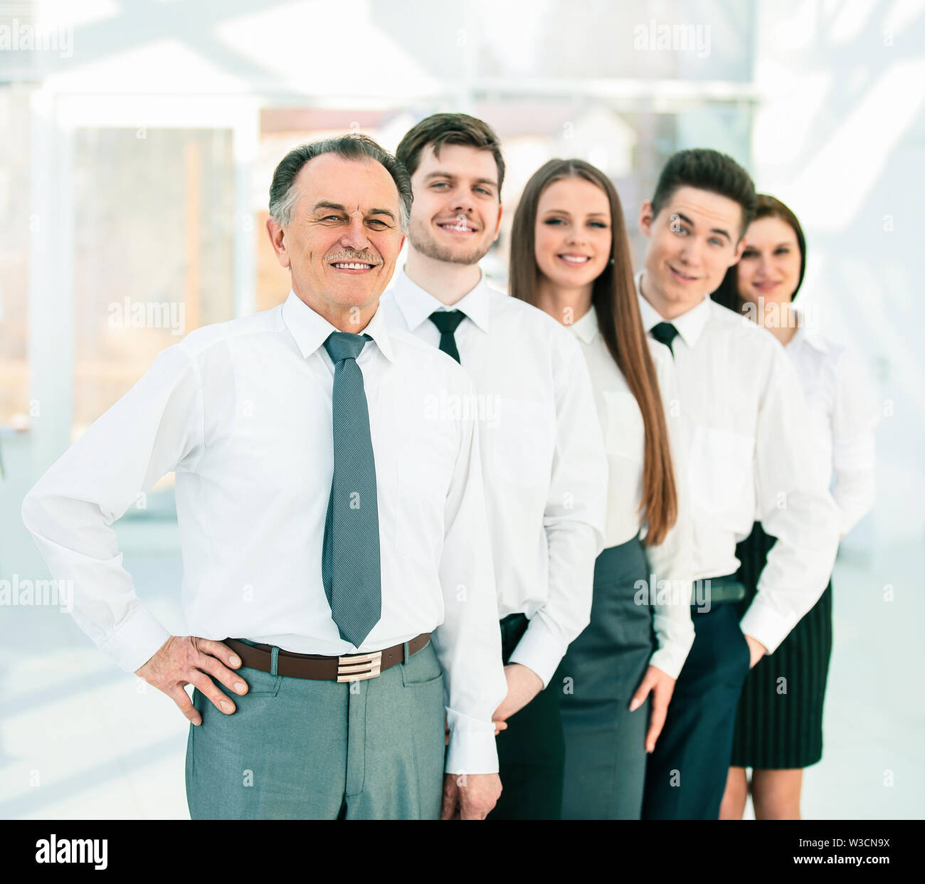 close up.group of young business people standing in a row Stock Photo ...