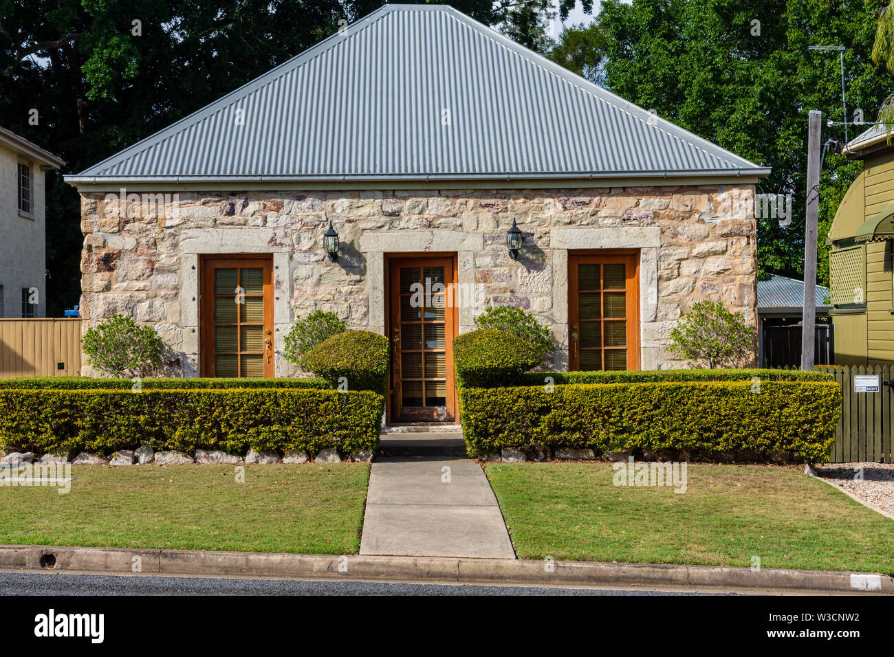 A Stone Cottage style House in an Australian Suburb Stock Photo
