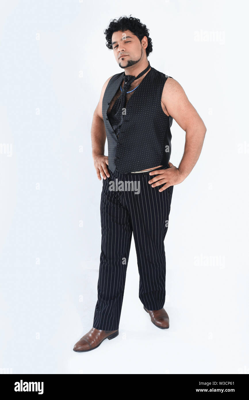 stylish man dancer posing for the camera .isolated on a white background. Stock Photo