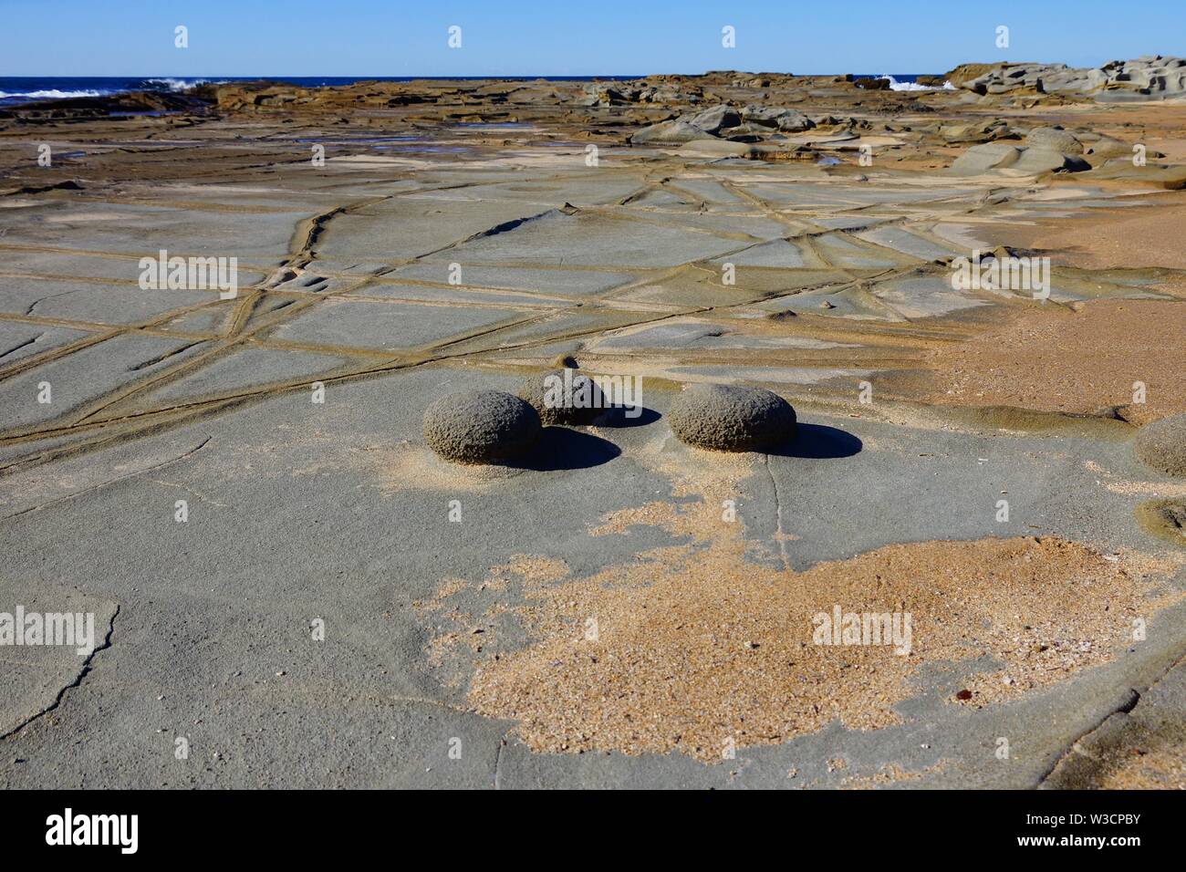 Unusual rock formations by the sea Stock Photo
