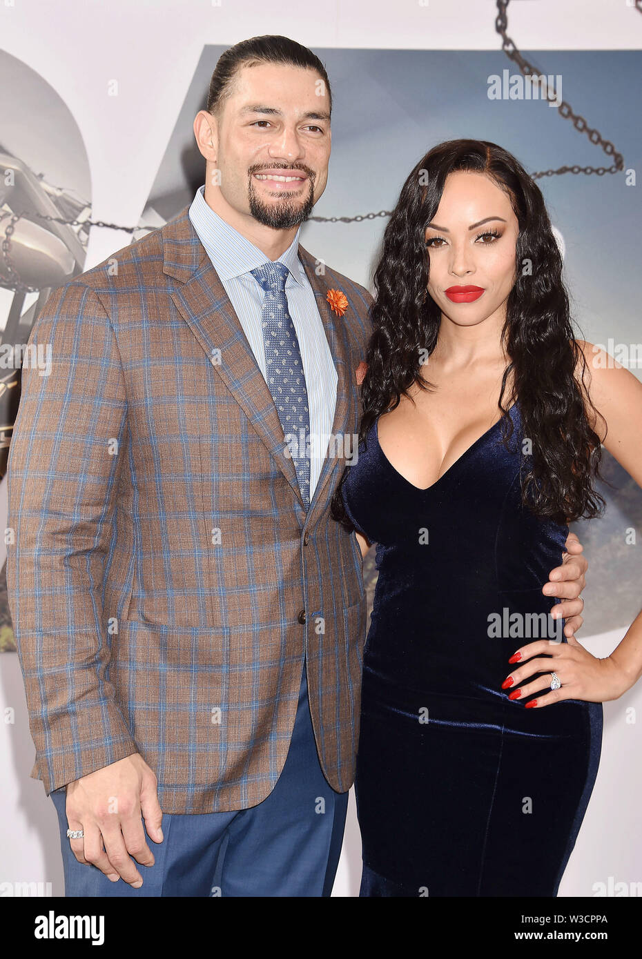 HOLLYWOOD, CA - JULY 13: Roman Reigns (L) And Galina Becker Attend The Premiere Of Universal