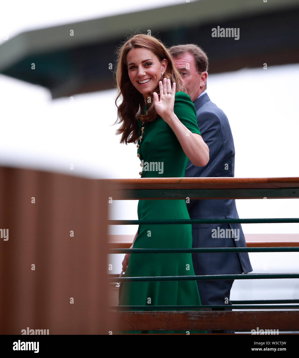 Wimbledon, London, UK. 13th July 2019. Kate Middleton (Duchess of  Cambridge) waves to the crowds as she arrives at The Wimbledon  Championships tennis, Wimbledon, London on July 13, 2019 Credit: Paul  Marriott/Alamy